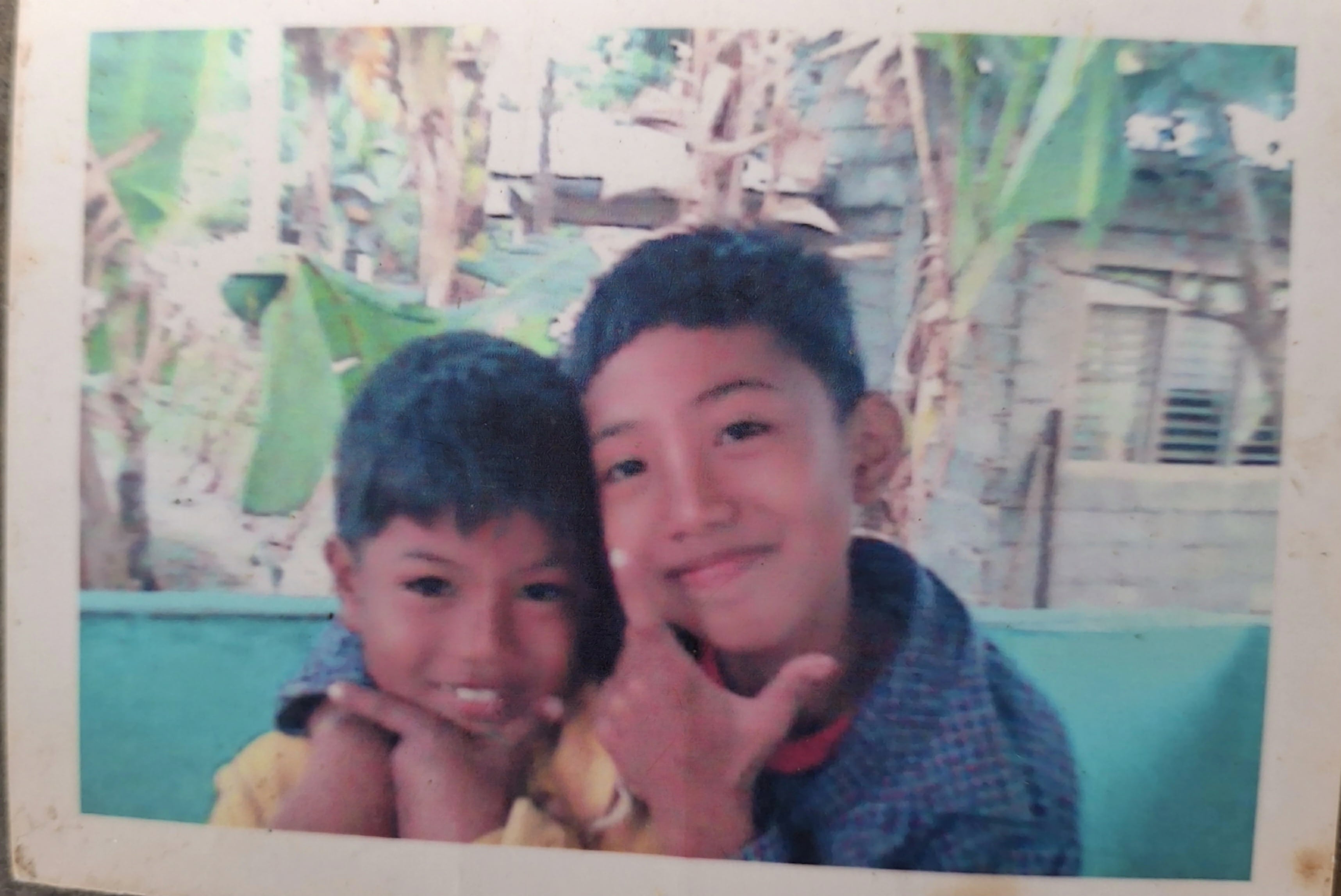 Childhood photo with older brother